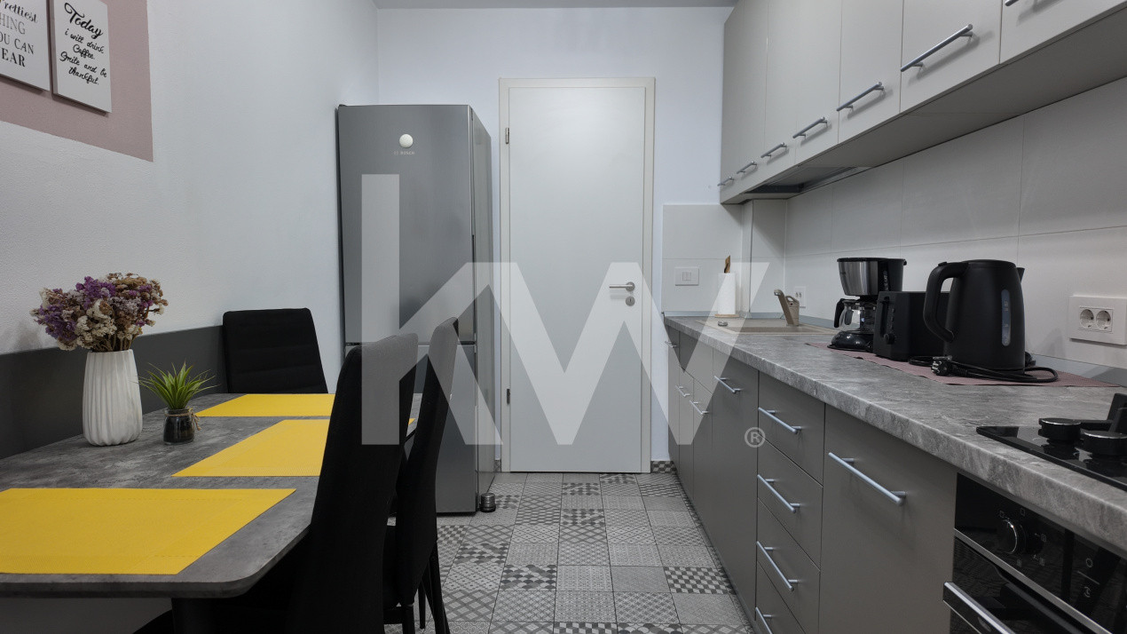  Apartament cu 2 camere, modern și complet mobilat, în zona Tractorul