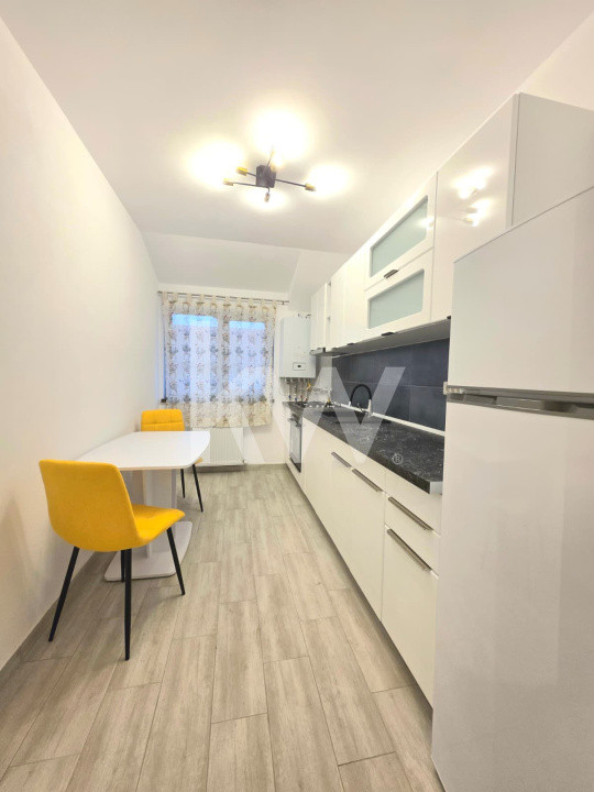  Garsoniera de inchiriat + loc de parcare 