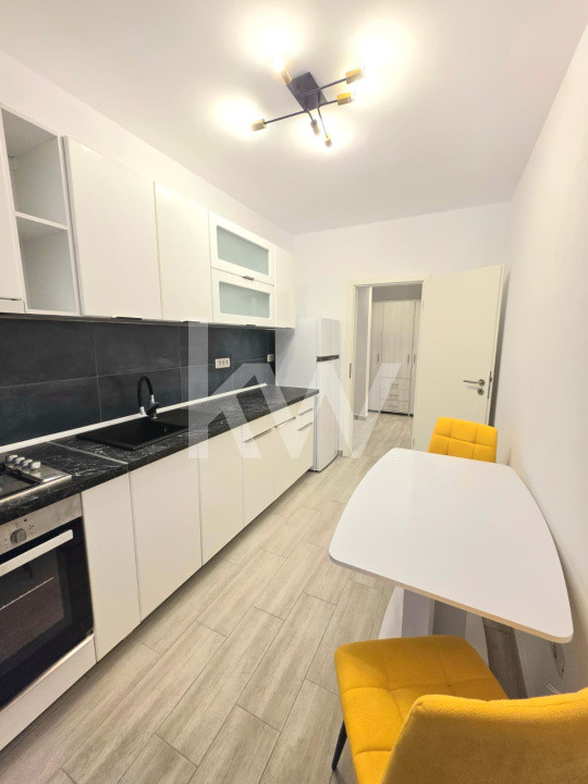  Garsoniera de inchiriat + loc de parcare 