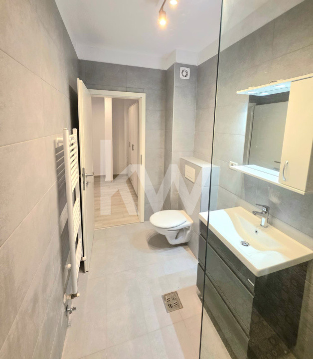  Garsoniera de inchiriat + loc de parcare 