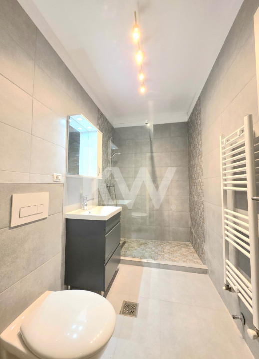  Garsoniera de inchiriat + loc de parcare 