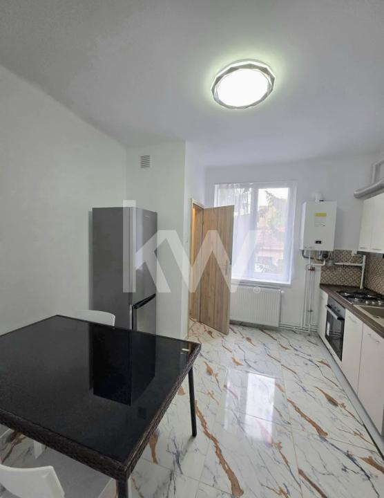 Apartament 2,5 camere decomandat + 2 locuri de parcare 