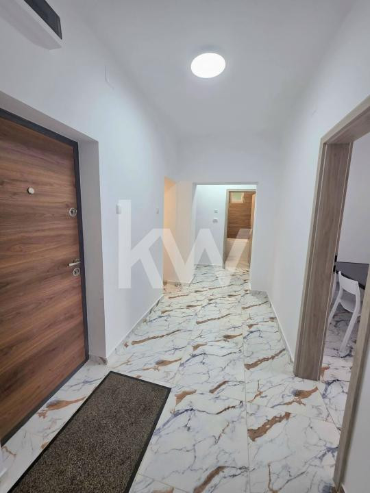 Apartament 2,5 camere decomandat + 2 locuri de parcare 