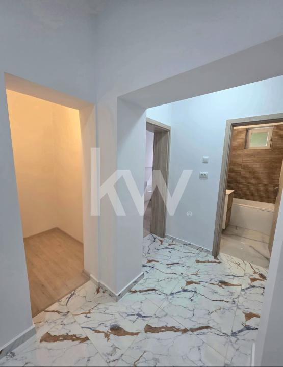 Apartament 2,5 camere decomandat + 2 locuri de parcare 