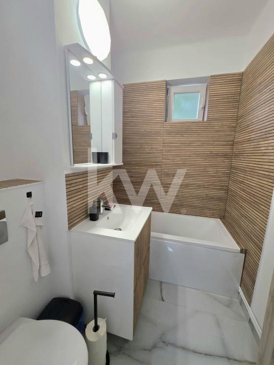 Apartament 2,5 camere decomandat + 2 locuri de parcare 