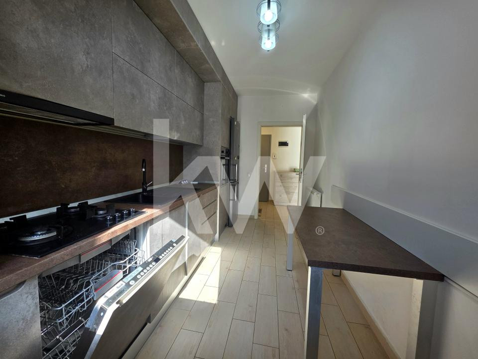 Apartament cu 2 camere cu boxa + loc de parcare 