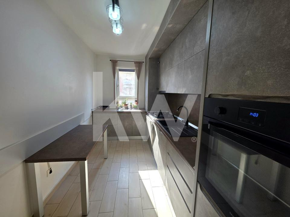 Apartament cu 2 camere cu boxa + loc de parcare 