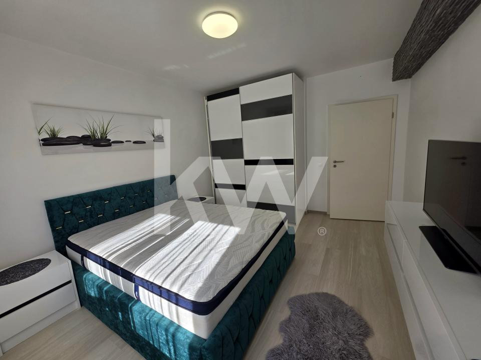 Apartament cu 2 camere cu boxa + loc de parcare 