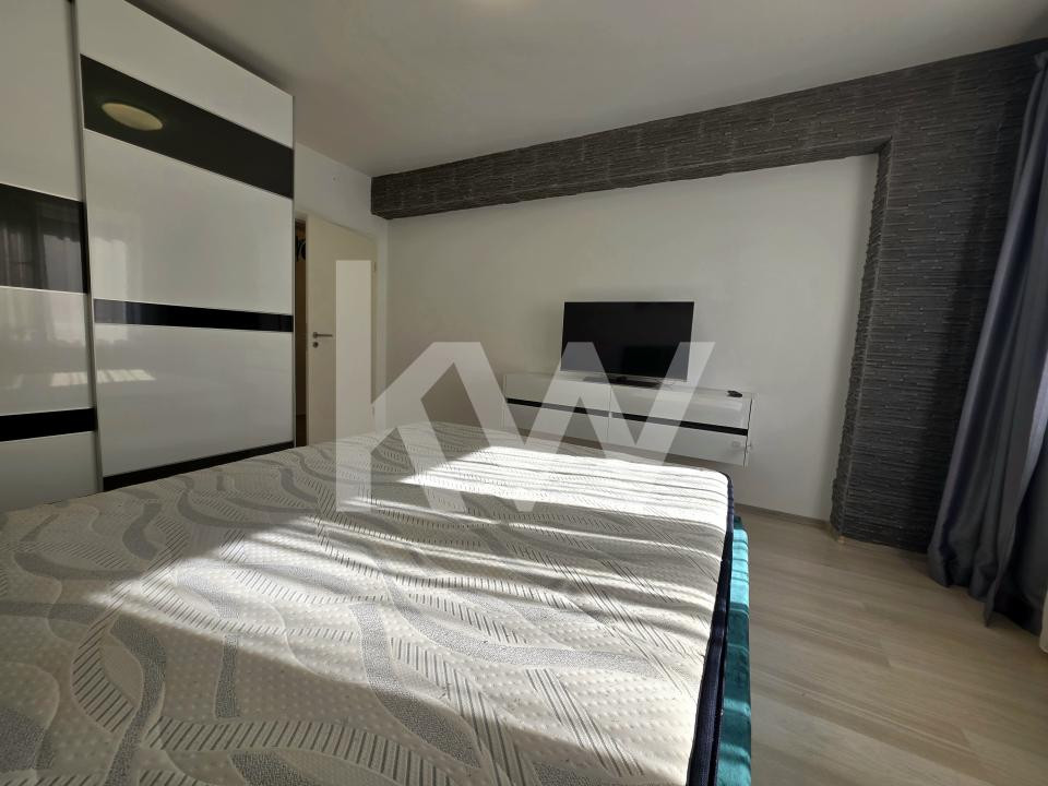 Apartament cu 2 camere cu boxa + loc de parcare 